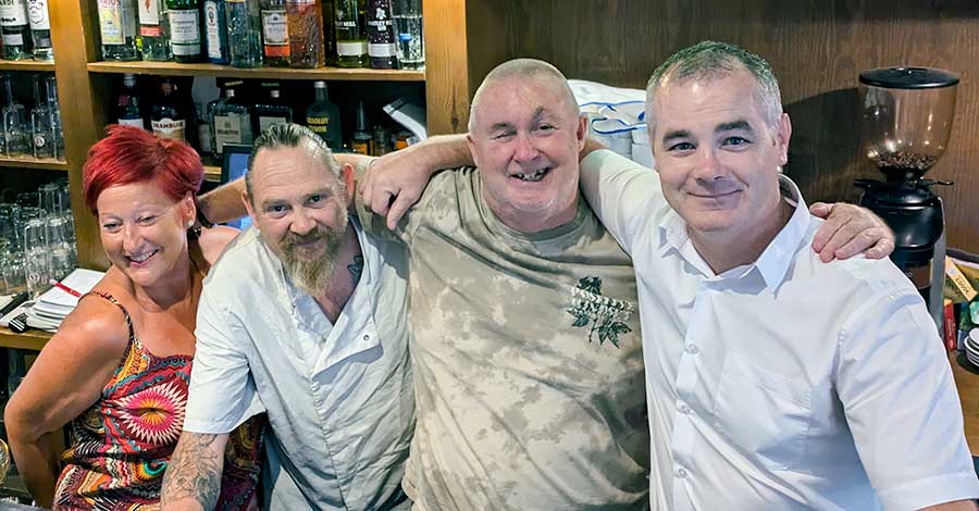 Lisa, Martin, Alan and Mike in Campbells bar, Roda.