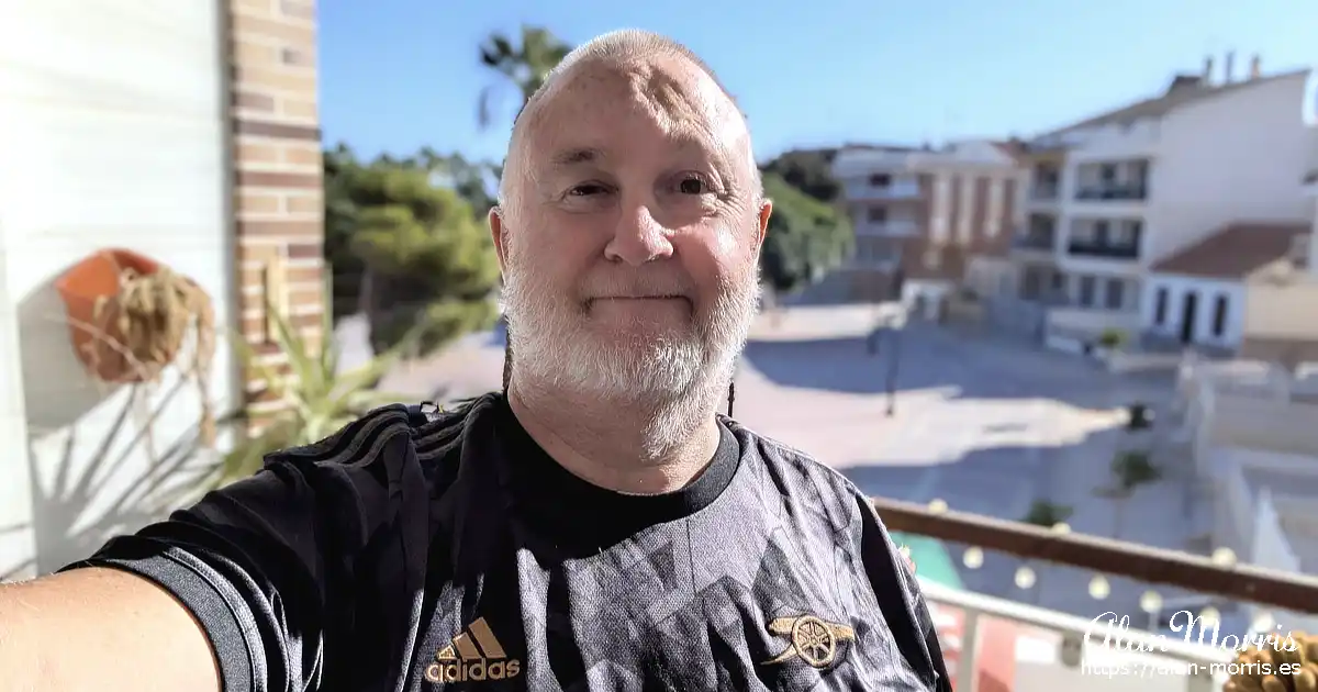 Alan Morris on the balcony of his apartment.