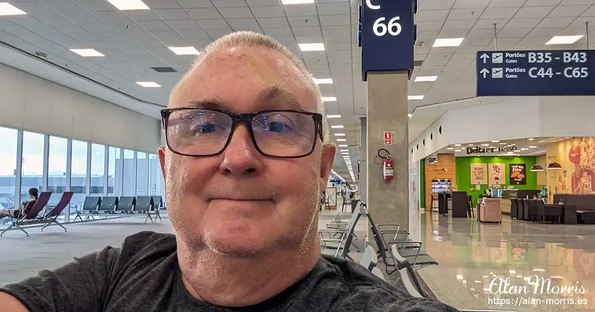 Alan Morris sat at the departure gate at Rio de Janeiro, International airport.