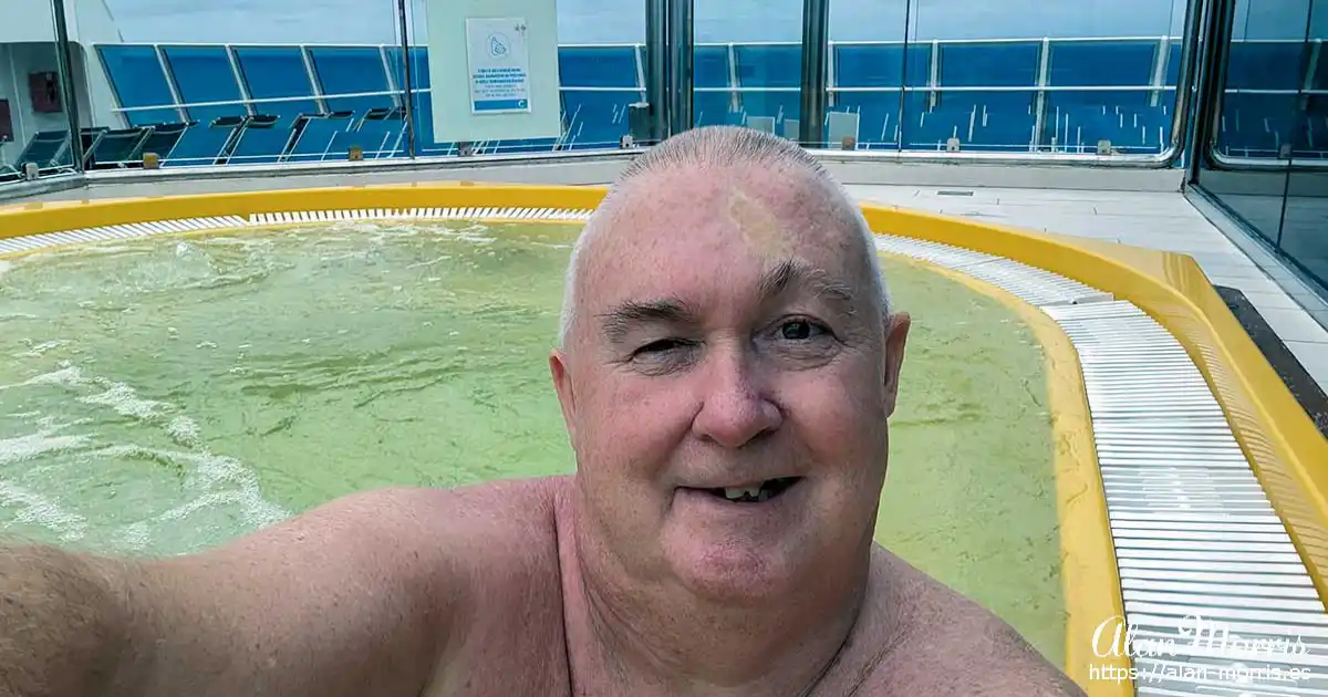 Alan Morris sat in a jacuzzi onboard the Costa Favolosa.