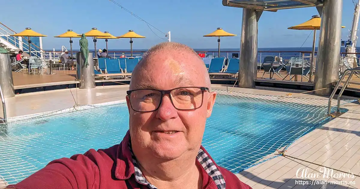 Alan Morris by the pool on the Costa Favolosa cruise ship.