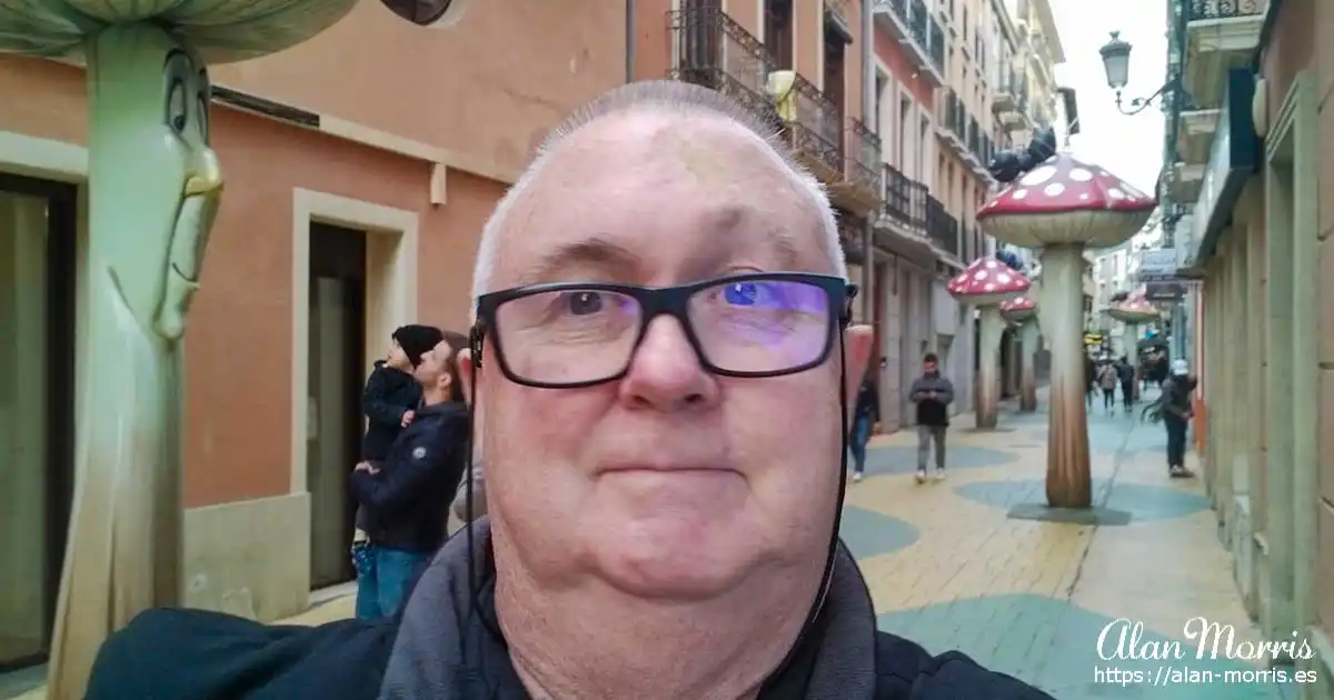 Alan Morris stood by the mushroom sculptures in Alicante.