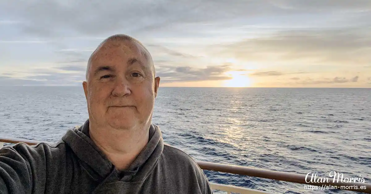 Alan Morris on the deck of the NCL Spirit in the Pacific Ocean.