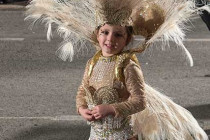 Young girl dressed up in her Carnival costume.