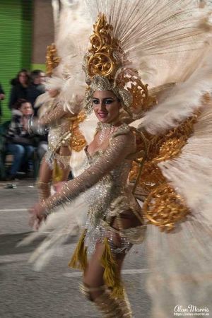 Beautiful smiling lady posing for a photo at the Aguilas Carnival.