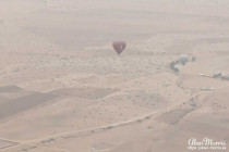 Two air balloons over the desert.