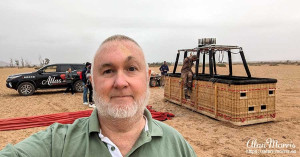 Alan Morris stood beside the basket of the air balloon he flew over the desert in. Alan Morris stood beside the basket of the air balloon he flew over the desert in.