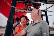 Lisa Biles and Alan Morris in the basket of an air balloon.