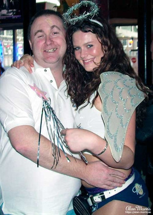 Alan Morris with his waitress in Teasers, Amsterdam.