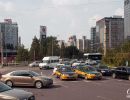 Heavy traffic on a roundabout in downtown Beijing.