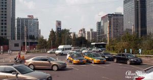 Heavy traffic on a roundabout in downtown Beijing.