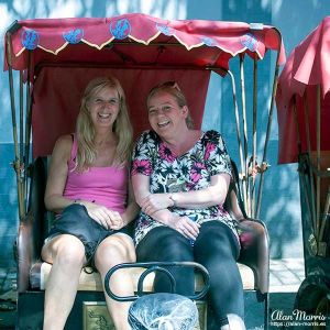 Melanie Lunn & Tracy Good in a tuk tuk in the Beijing Hutongs.