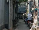 Bicycles propped outside homes in the Beijing Hutongs.