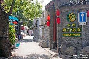 Narrow street with restaurants in it, Beijing Hutongs.