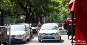 Tuk-tuk convoy in downtown Beijing.