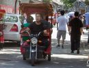 Tuk tuk on a street in the Beijing Hutongs.