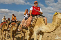 Alan Morris and Lisa Biles, on the camels they rode through the desert.