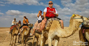 Alan Morris and Lisa Biles, on the camels they rode through the desert. Alan Morris and Lisa Biles, on the camels they rode through the desert.