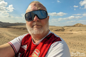 Alan Morris sat on his camel as he rode through the desert. Alan Morris sat on his camel as he rode through the desert.