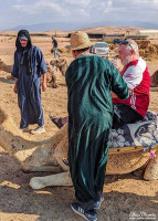 Alan Morris on a camel in the desert before it gets up. Alan Morris on a camel in the desert before it gets up.