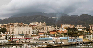 Storm clouds form over the mountains in Ceuta.