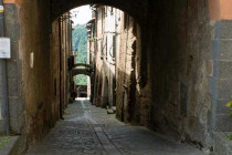 Narrow street in Civita di Bagnoregio, Italy.