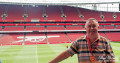 Alan Morris stood in the Directors box at the Emirates Stadium.