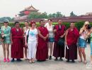 Girls & monks outside the Forbidden City.