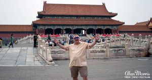 Alan Morris stood inside the Forbidden City.