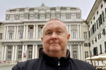 Alan Morris, stood in front of the Doge's Palace in Genoa
