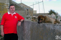 Alan Morris & a monkey on the Rock of Gibraltar.