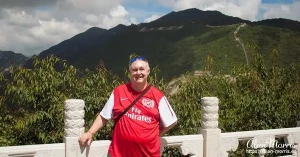 Alan Morris stood on top of the Great Wall of China. Alan Morris stood on top of the Great Wall of China.