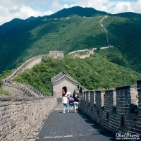 The Great Wall of China winds its way across mountains. The Great Wall of China winds its way across mountains.