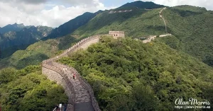 The Great Wall of China winds its way across mountains. The Great Wall of China winds its way across mountains.