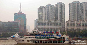 Cruise boat on the Huangpu River in Shanghai. Cruise boat on the Huangpu River in Shanghai.