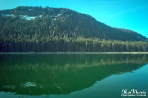 Reflection of the mountain in the water at Icy Strait Point, Alaska.