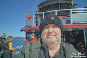 Alan Morris on the deck of the small boat in Alaska.