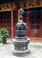 Elephant statue in the courtyard garden at the Jade Buddha Temple. Elephant statue in the courtyard garden at the Jade Buddha Temple.