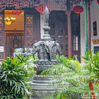 Elephant statue in the courtyard garden at the Jade Buddha Temple. Elephant statue in the courtyard garden at the Jade Buddha Temple.