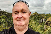 Alan Morris in front of Opaekaa Falls.