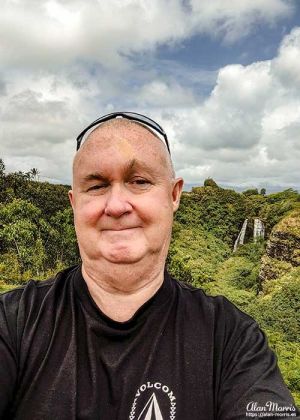 Alan Morris in front of Opaekaa Falls.