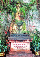 A golden Buddha on the path leading away from the Leshan Giant Buddha. A golden Buddha on the path leading away from the Leshan Giant Buddha.