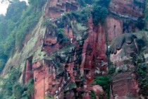 Steps carved in the rock lead down to the base of the Giant Leshan Buddha.