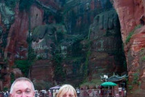 Alan Morris & Melanie Lunn, on a boat in front of the Giant Leshan Buddha.