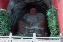 A sitting Buddha on the path up to the Giant Leshan Buddha.