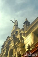 A Saint's statue on top of the Lima Cathedral A Saint's statue on top of the Lima Cathedral