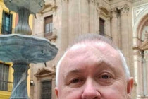 Alan Morris, next to a fountain outside the Malaga Cathedral.