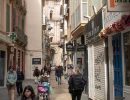 Narrow street in Malaga leading to one of the Cities churches.