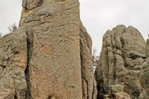 Road passing through the Needles Eye rock formation.