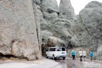 Minibus entering a tunnel through the Needles Eye rock formation.